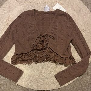 Unique brown cardigan.